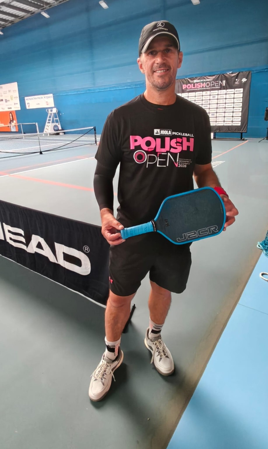 Wojciech Kmiecik z rakietką na turnieju Polish Open 2026